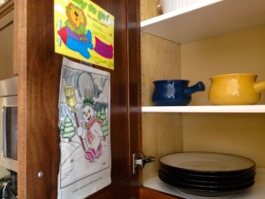 Display items inside cupboard doors.